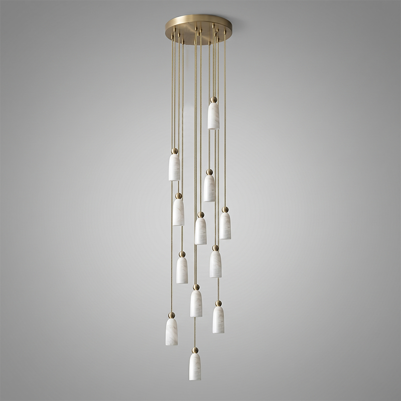 A cluster of Figure pendants with intentionally staggered heights for a sculptural look.