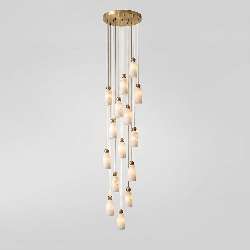A nine-head cluster of Figure pendants creating a centerpiece.