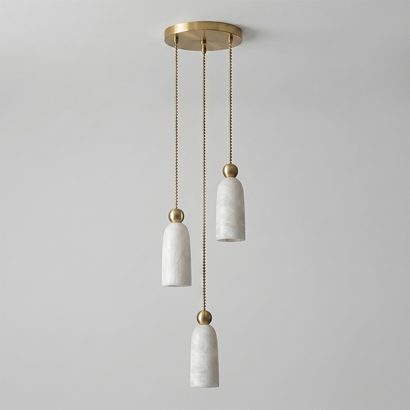 The warm light diffused through the natural alabaster shade.