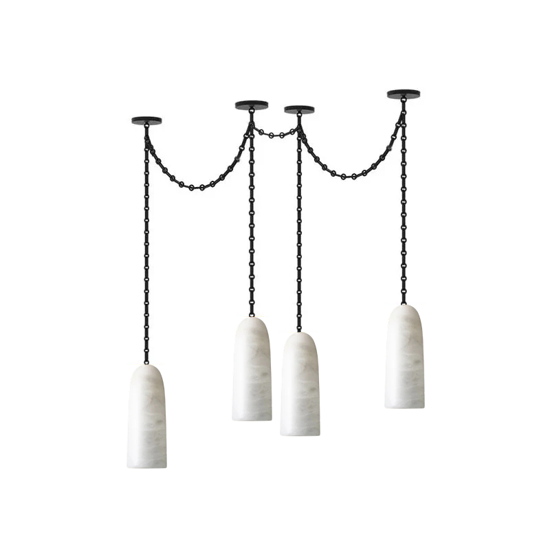 The white alabaster shade contrasted against the black iron chain.