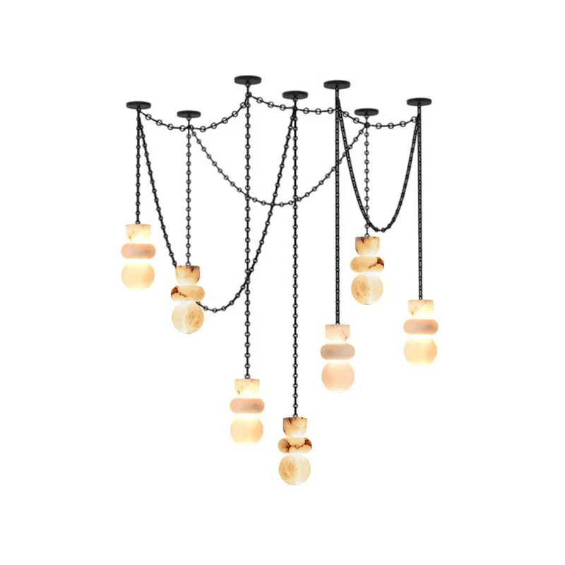 How the Orba chandelier blends industrial and luxury design elements.
