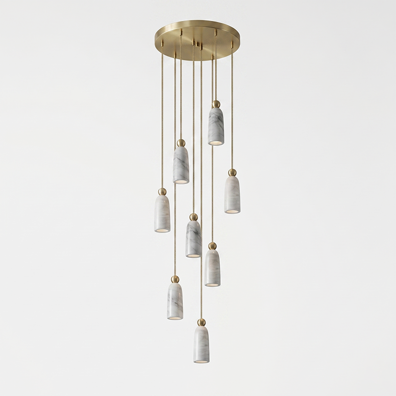 Side profile of the Figure pendant light against a neutral wall.