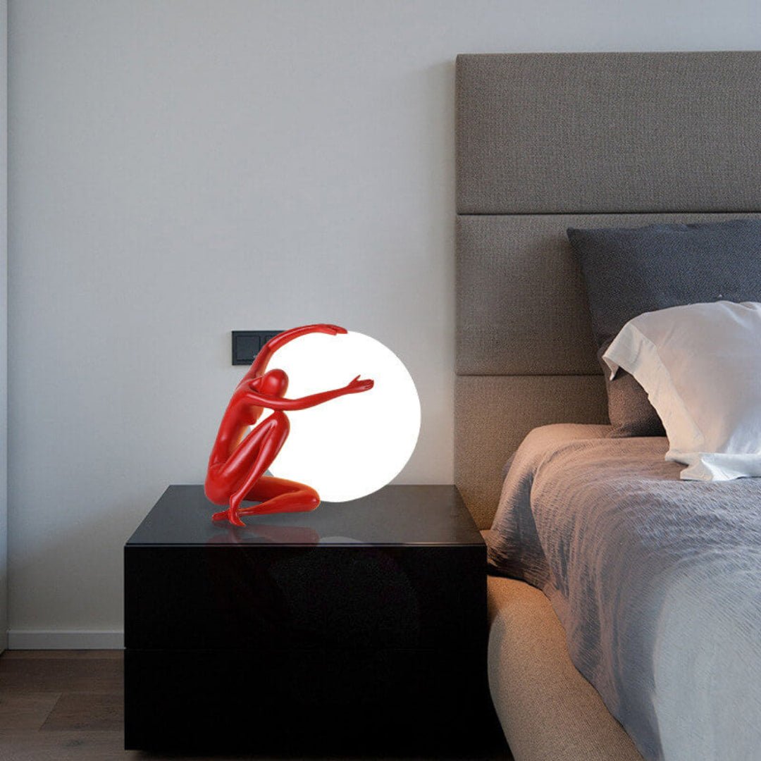 Cosmo Humanoid Ball Holding Table Lamp-Neutral Decor