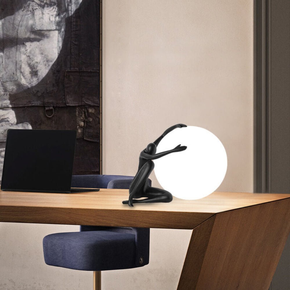 Cosmo Humanoid Ball Holding Table Lamp-Neutral Decor