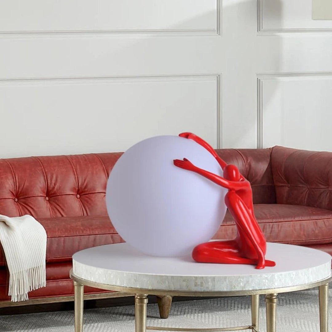Cosmo Humanoid Ball Holding Table Lamp-Neutral Decor