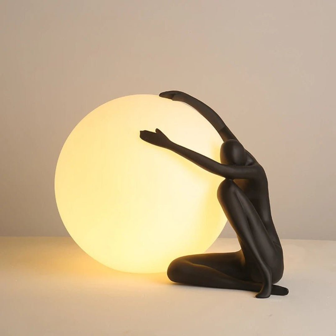 Cosmo Humanoid Ball Holding Table Lamp-Neutral Decor