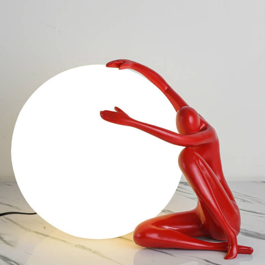 Cosmo Humanoid Ball Holding Table Lamp-Neutral Decor