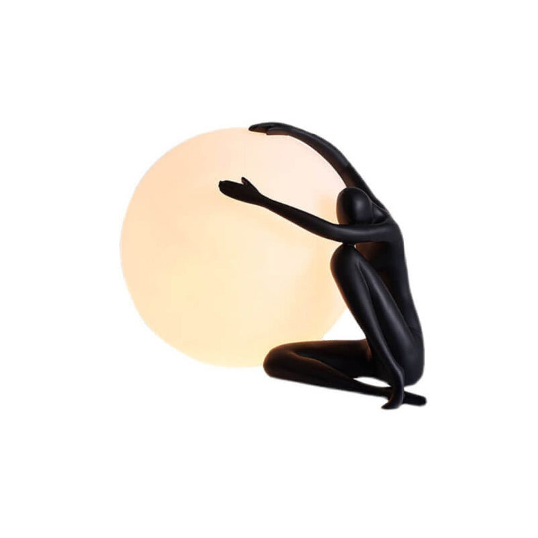 Cosmo Humanoid Ball Holding Table Lamp-Neutral Decor