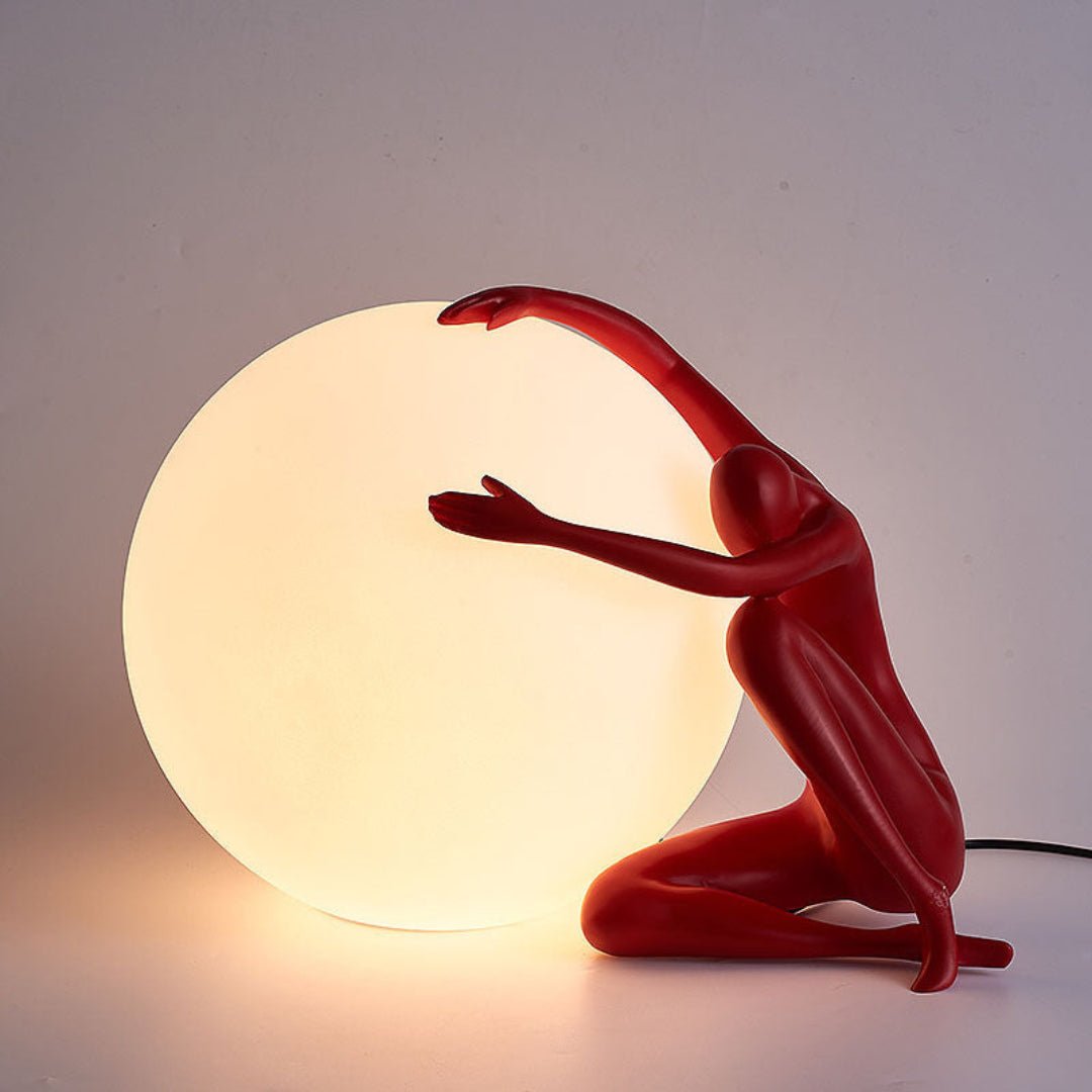 Cosmo Humanoid Ball Holding Table Lamp-Neutral Decor