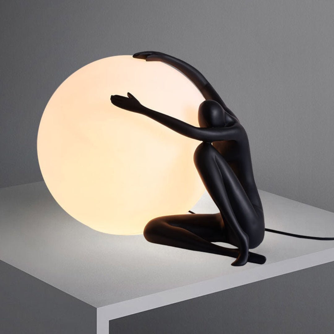 Cosmo Humanoid Ball Holding Table Lamp-Neutral Decor