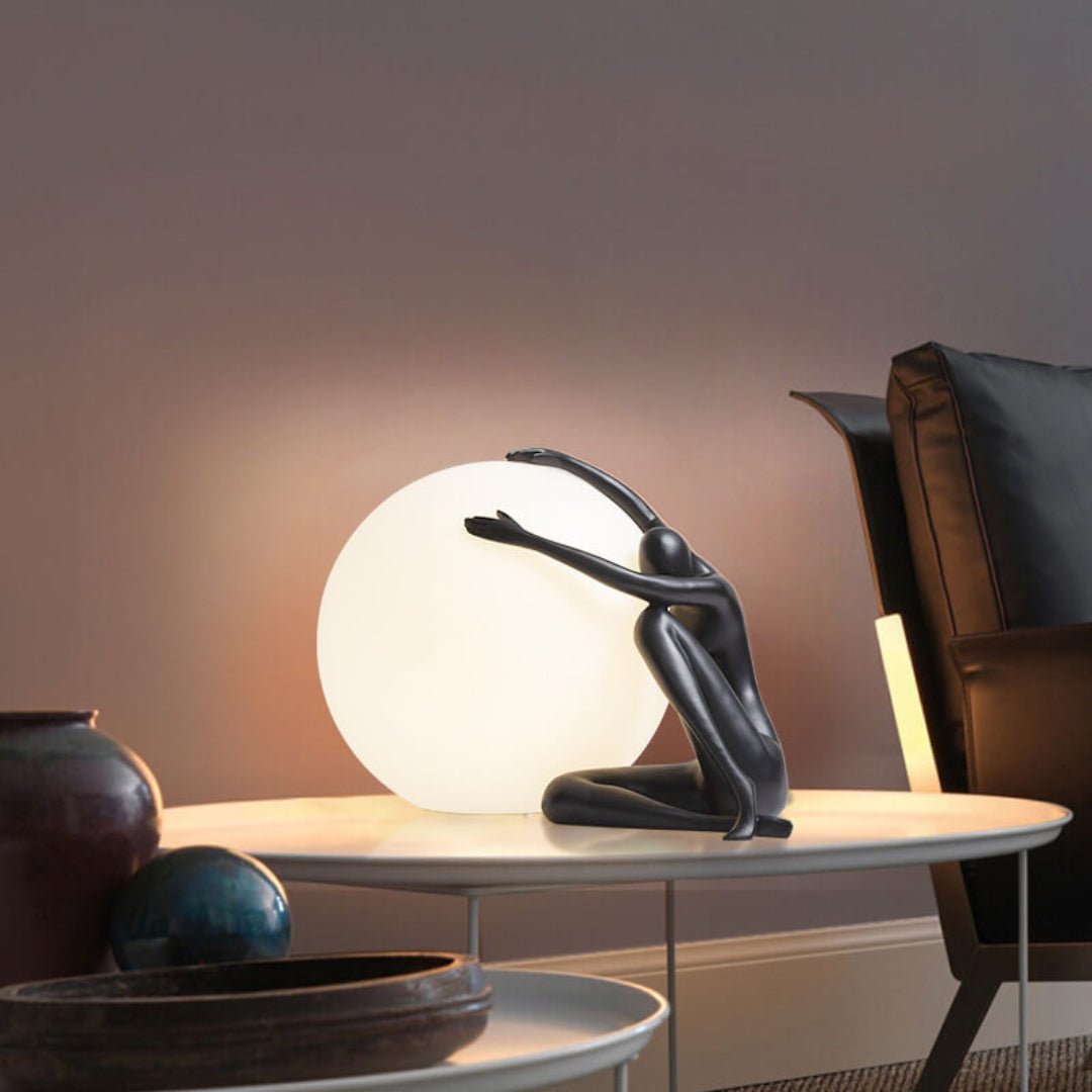 Cosmo Humanoid Ball Holding Table Lamp-Neutral Decor
