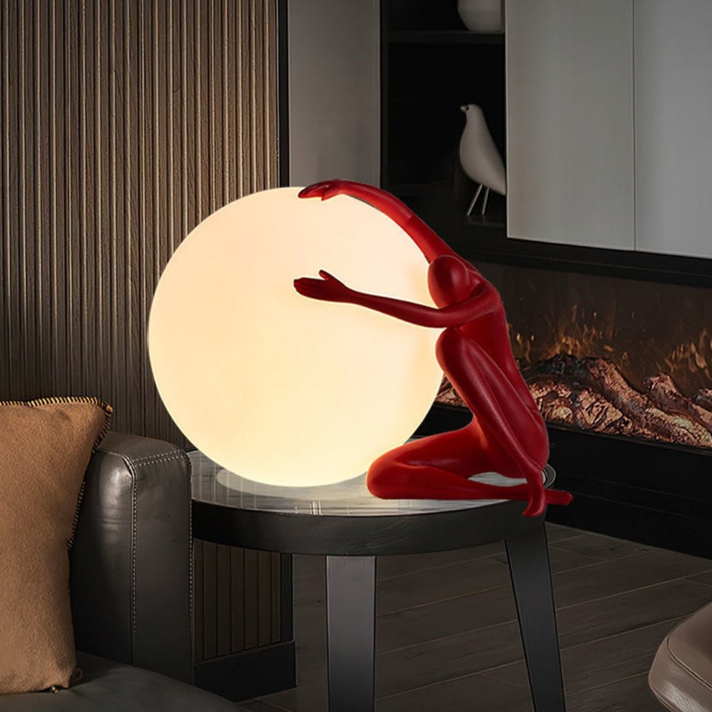 Cosmo Humanoid Ball Holding Table Lamp-Neutral Decor