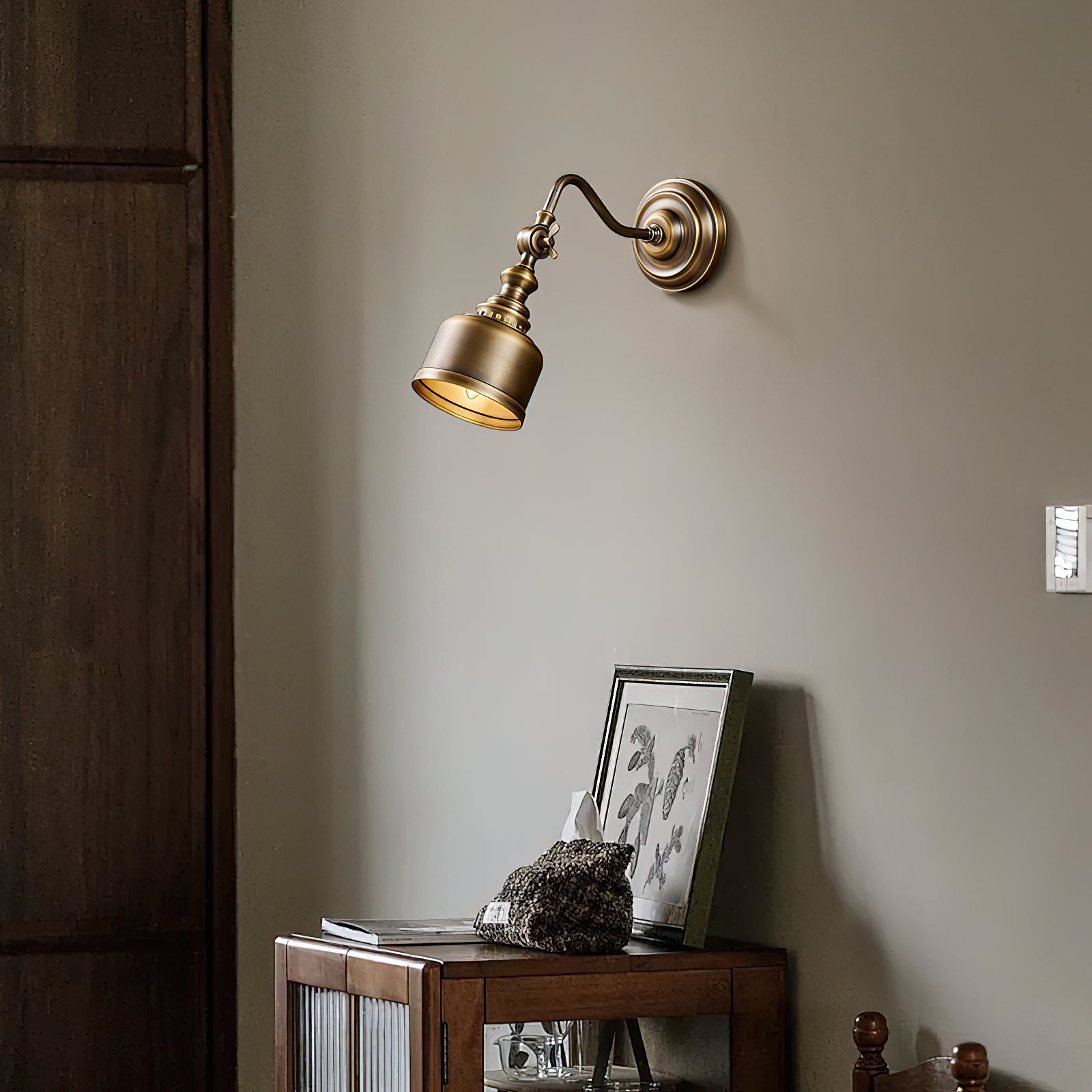 A pair of Addison Wall Lamps flanking a headboard.