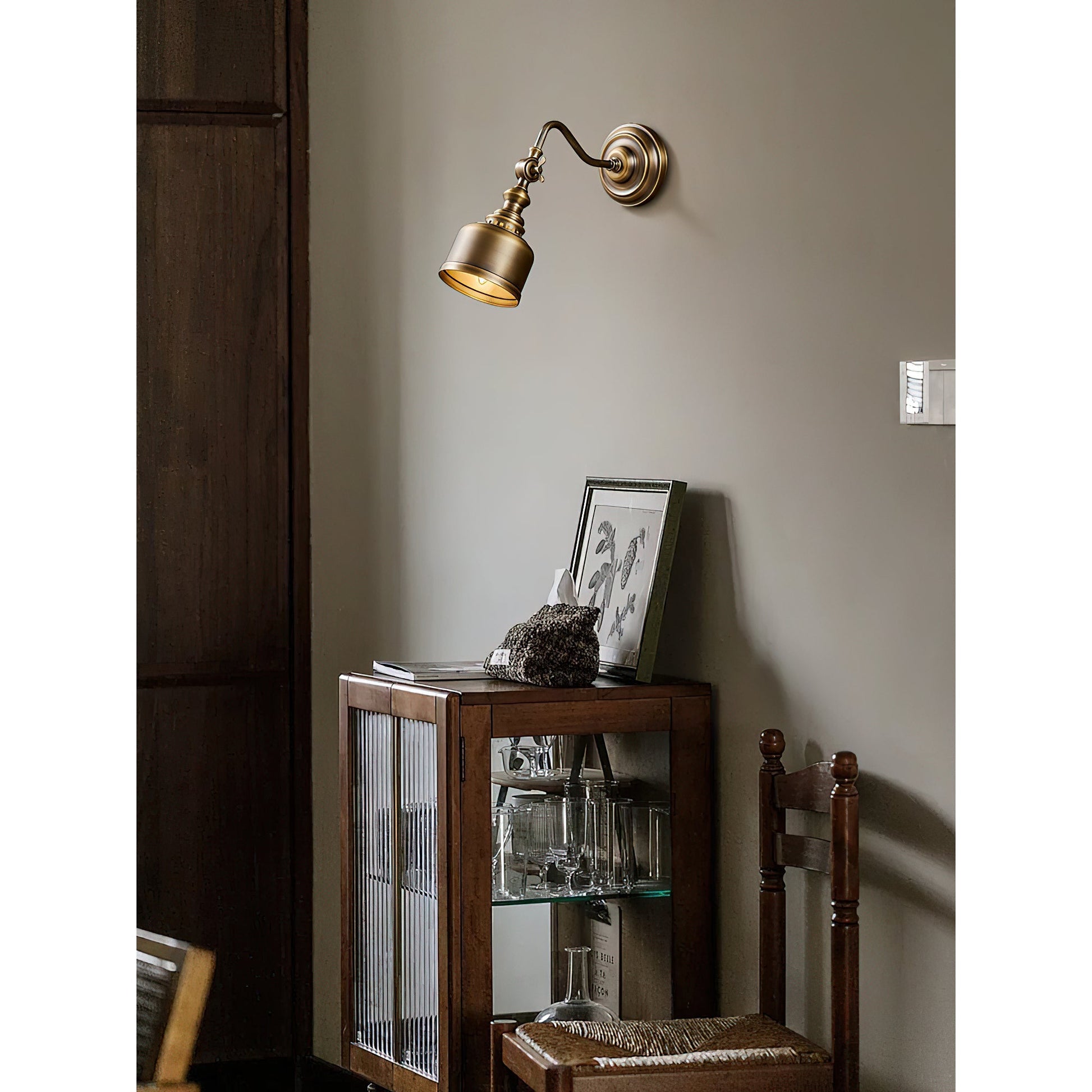 Addison Wall Lamp in a library or study setting.
