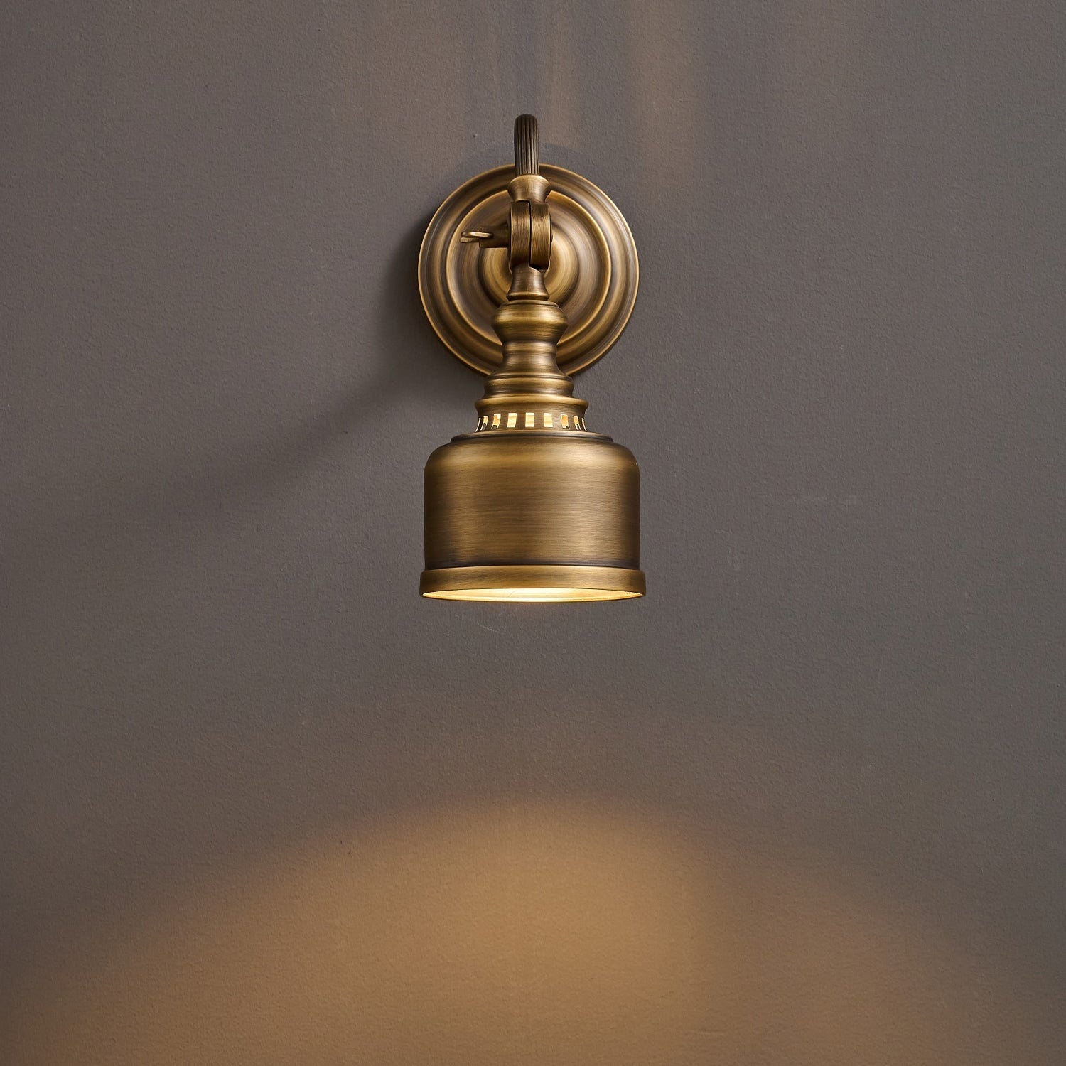 The lamp's arm pivoted upwards.