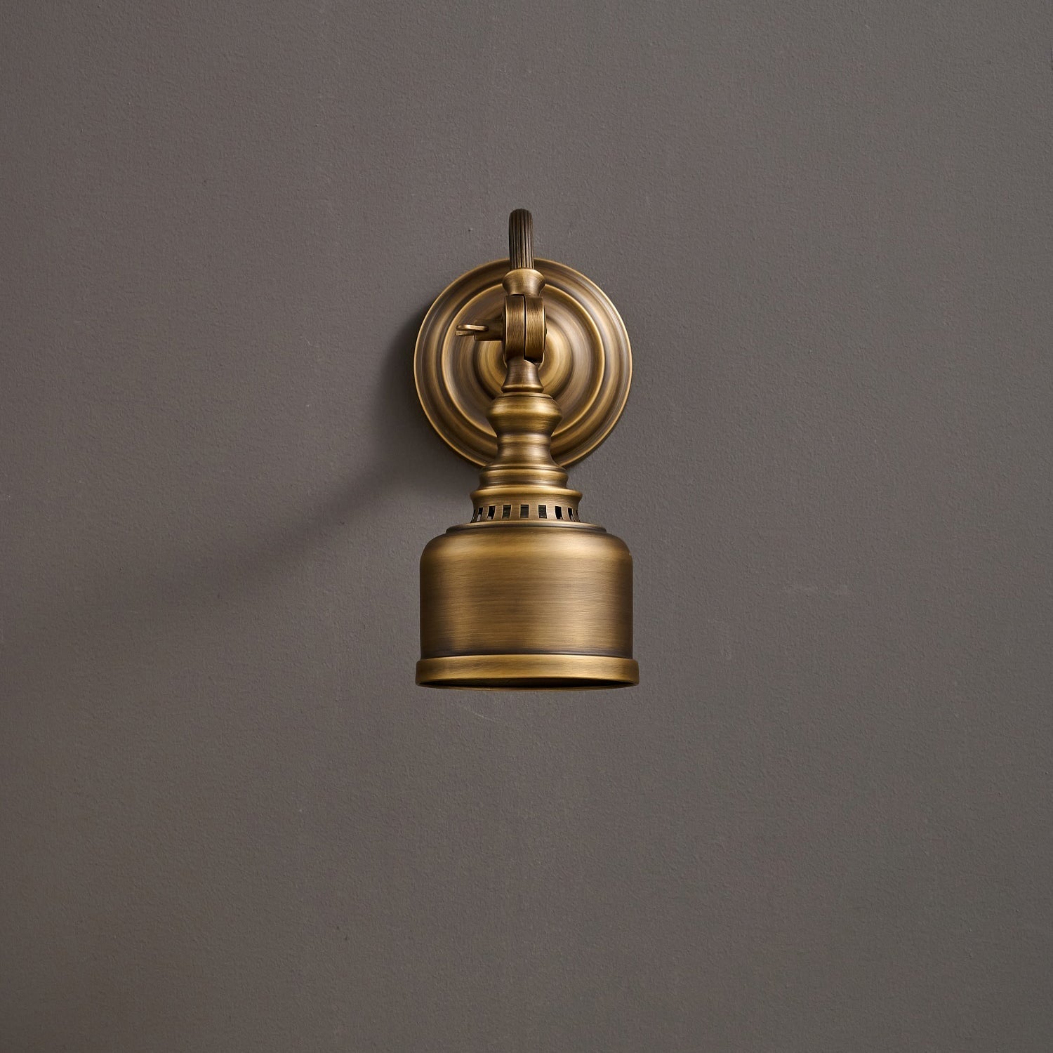 The lamp's shade tilted to its maximum angle.