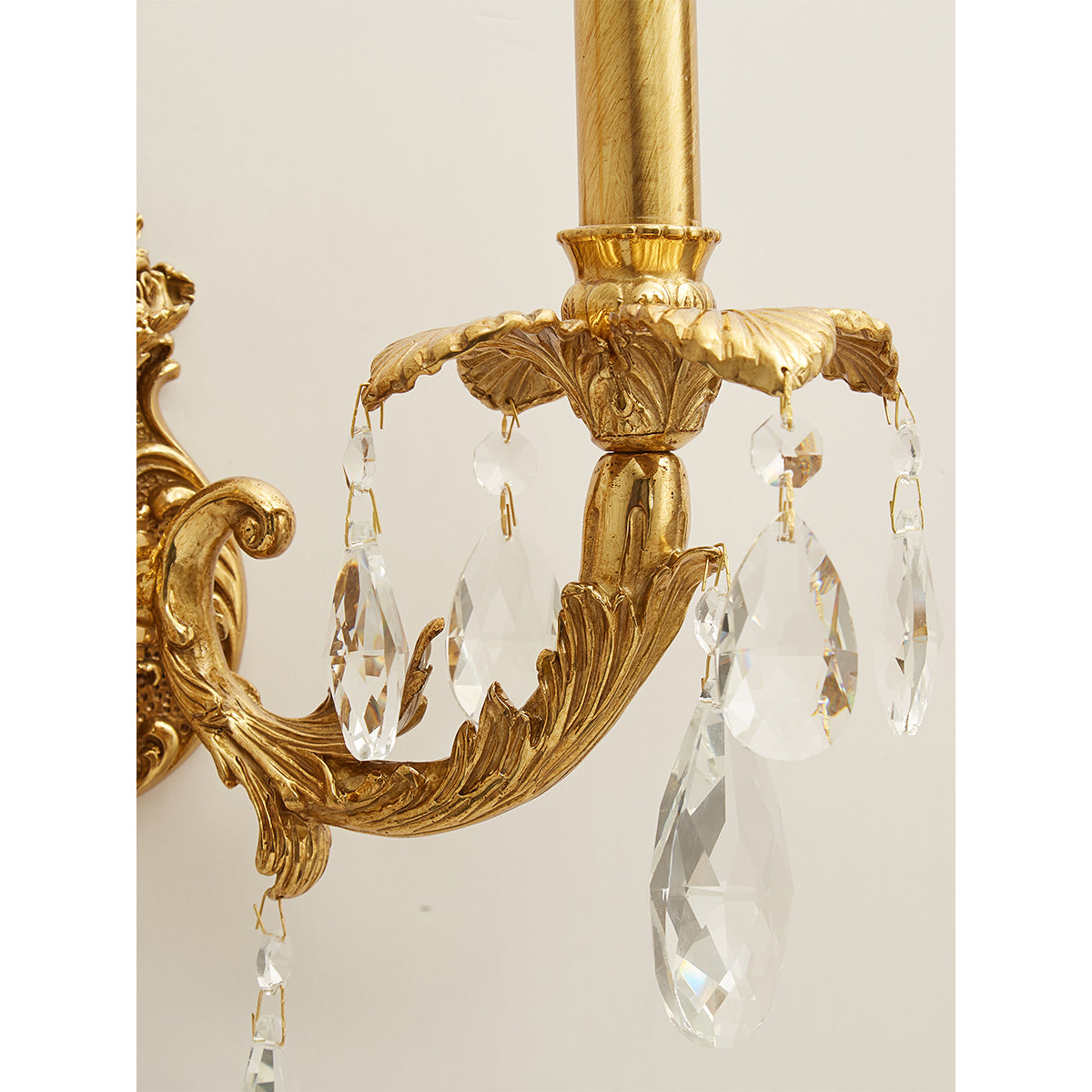 The Adriana Wall Lamp in a classic dining room setting.