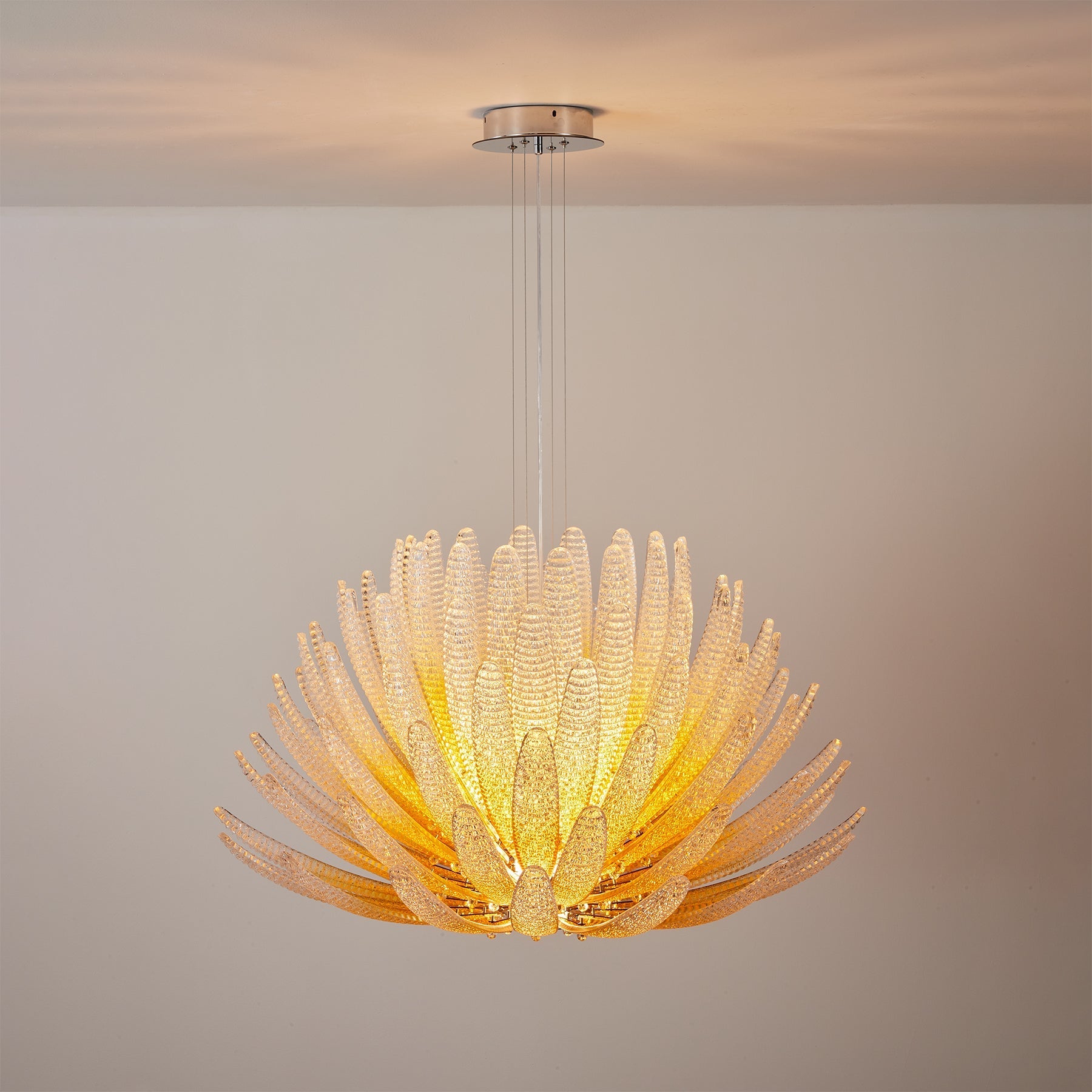 Close-up of the hand-struck glass foliage on the Agave Chandelier.