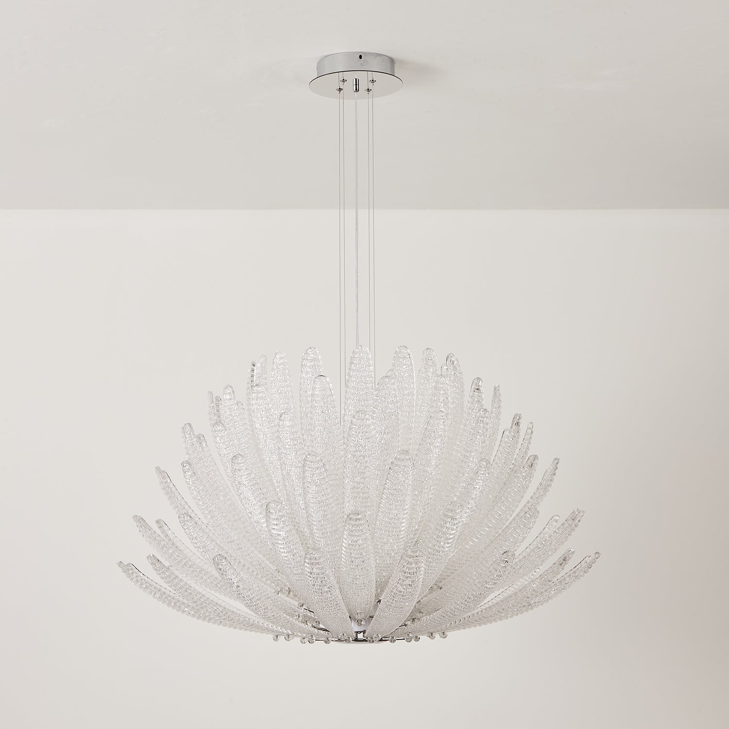 Lifestyle image featuring the Agave Starburst Chandelier in a luxurious home.