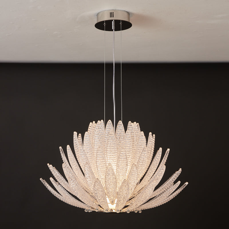 The purple glass Agave Chandelier adding a pop of color to a neutral space.