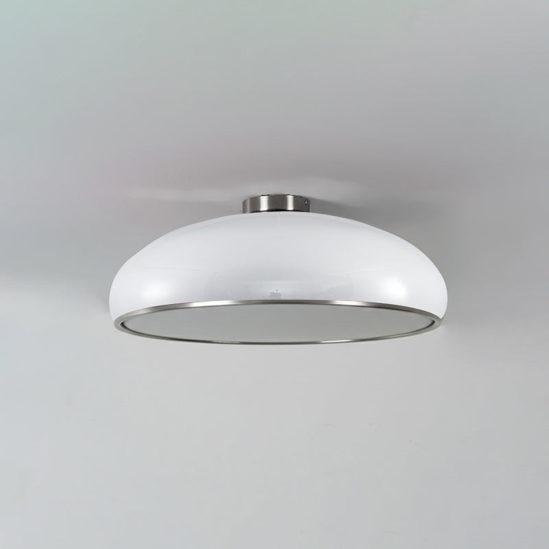 The Aicia Ceiling Light paired with a vintage-style Edison bulb.
