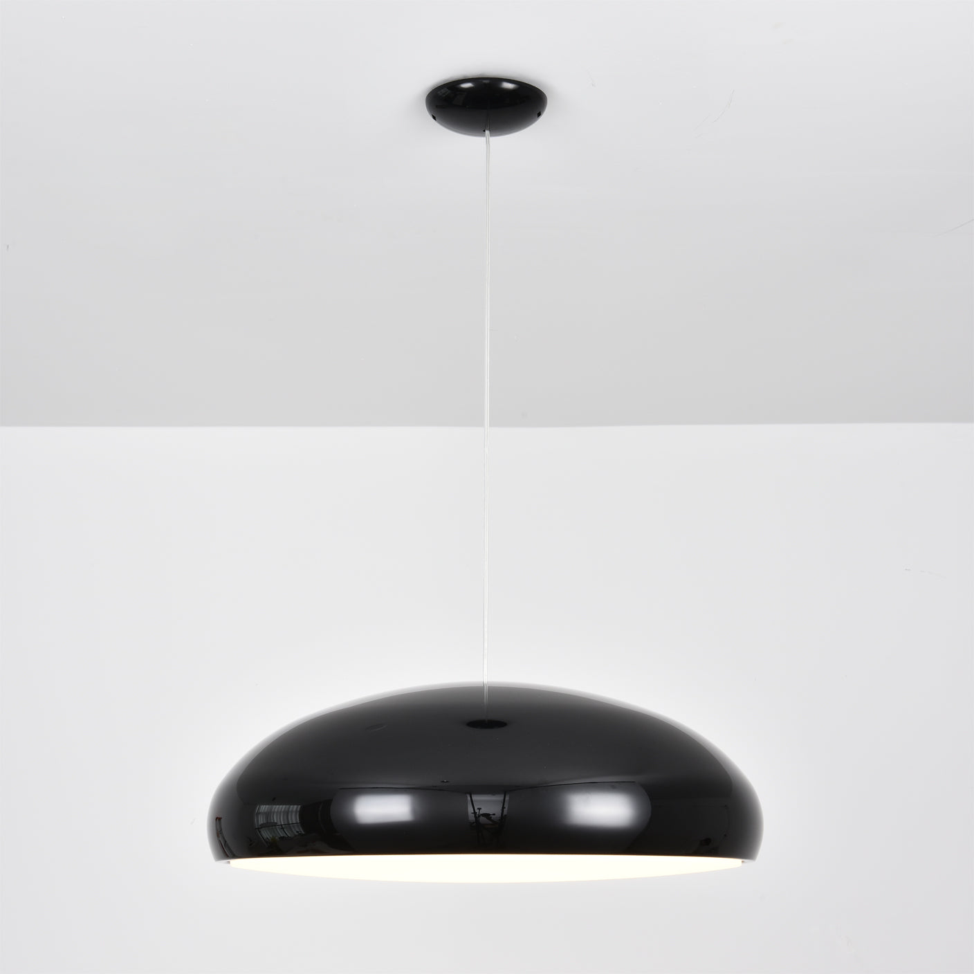 Close-up of the Aicia Pendant Light's smooth aluminum finish.