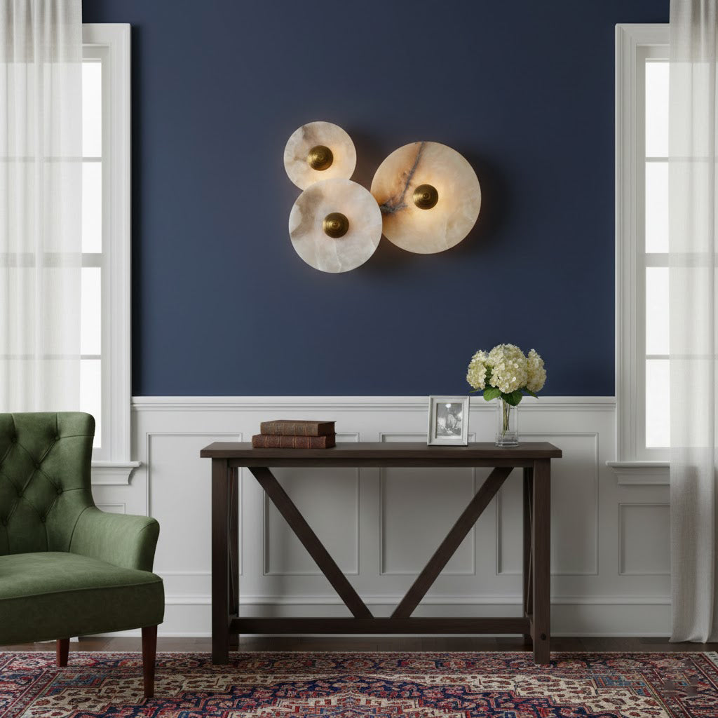 Wall sconce shown illuminating a modern living room.