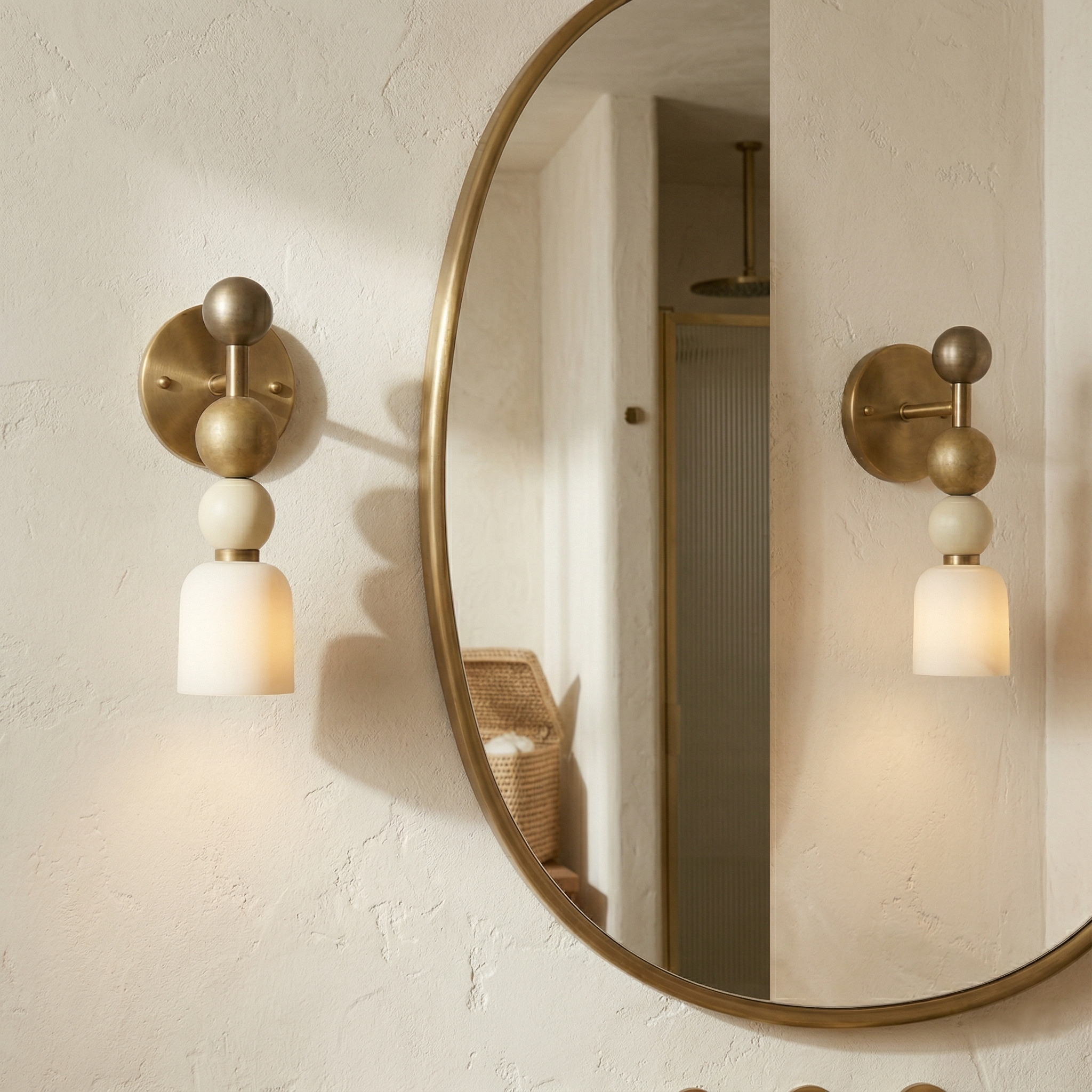 A pair of Flume Wall Lamps flanking a hallway mirror.