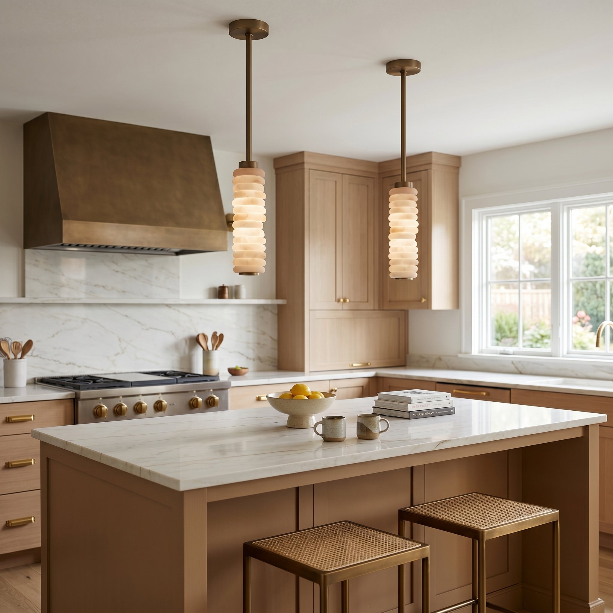 A pair of Payson pendants hanging over a kitchen island.