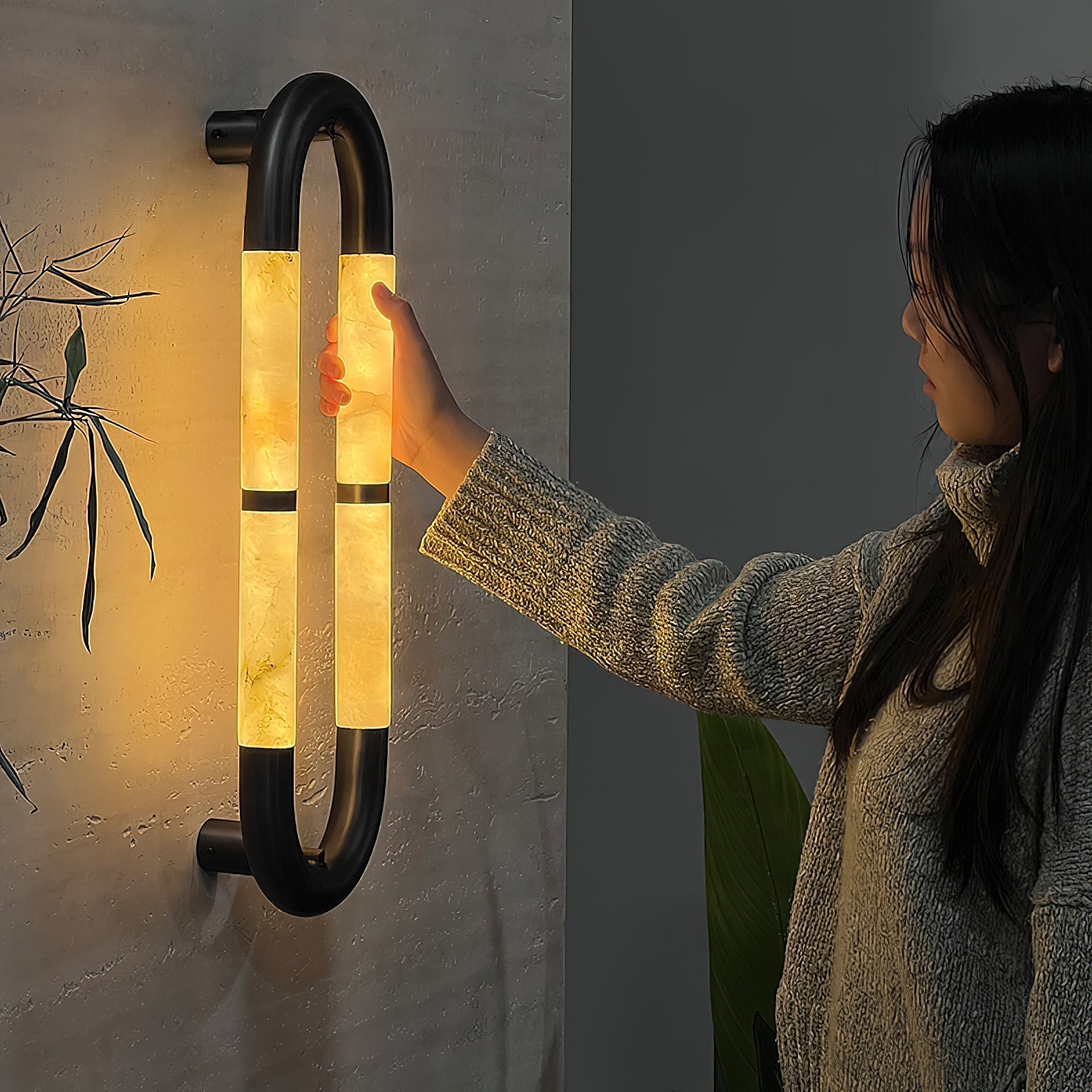 Side view of the white finish Alabaster Banded KoKo Sconce.
