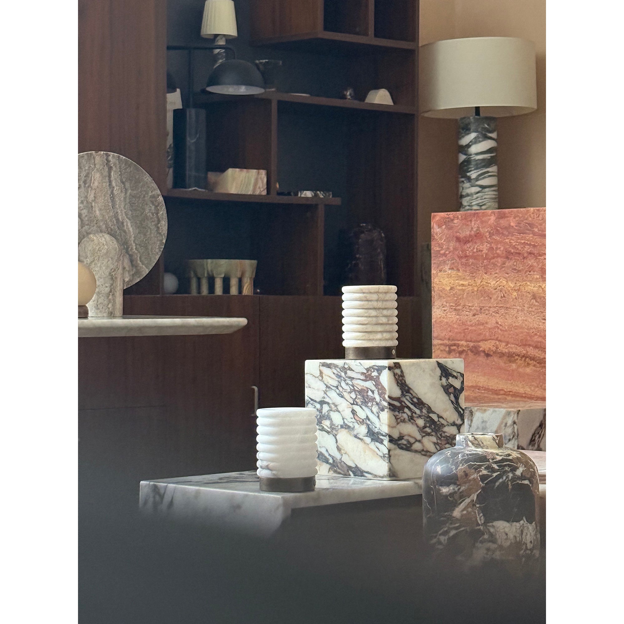 The white finish of the alabaster table lamp.
