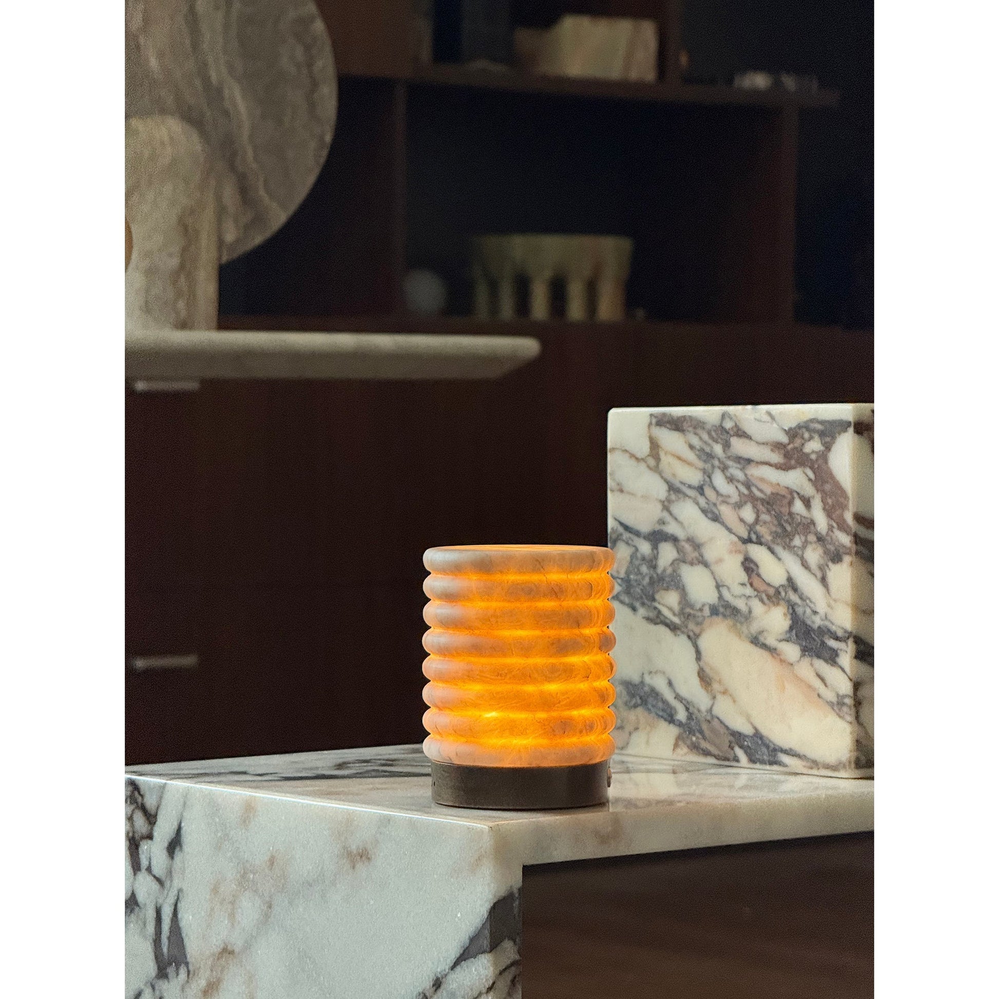 Dimensions of the alabaster table lamp: 8cm diameter by 10.5cm height.