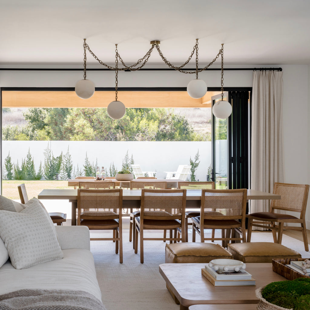 The Alabaster Swag Pendant Lamp with five globes.
