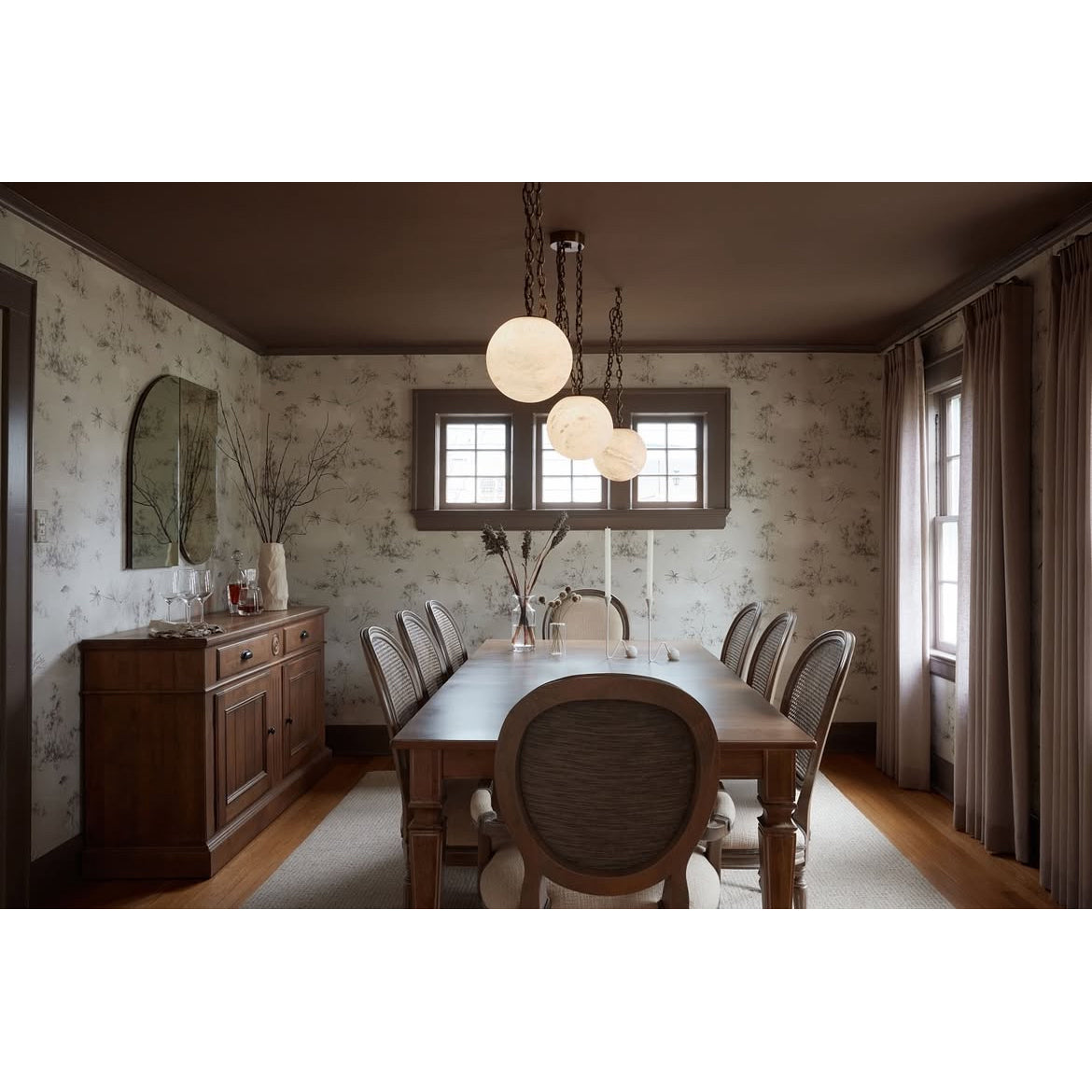 The swag pendant lamp in a bay-window reading corner.