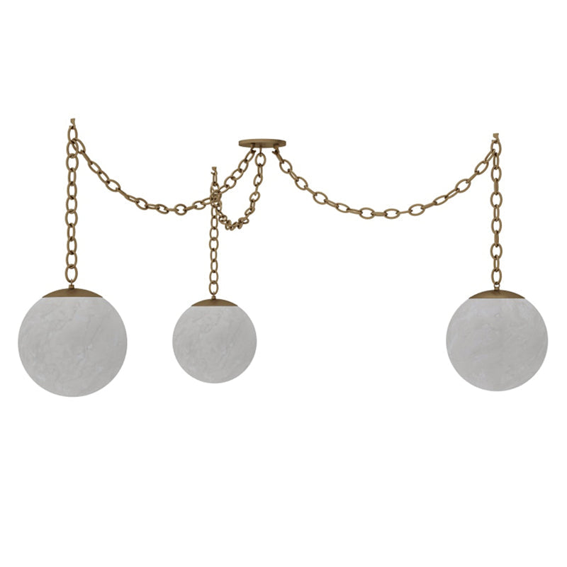The Alabaster Swag Pendant Lamp with matte black finish in a high-contrast interior.