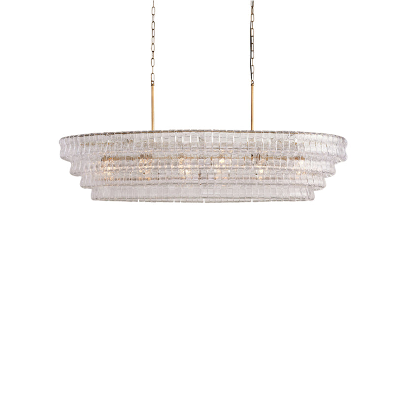 The amber glass Albano Chandelier in a cozy dining nook.