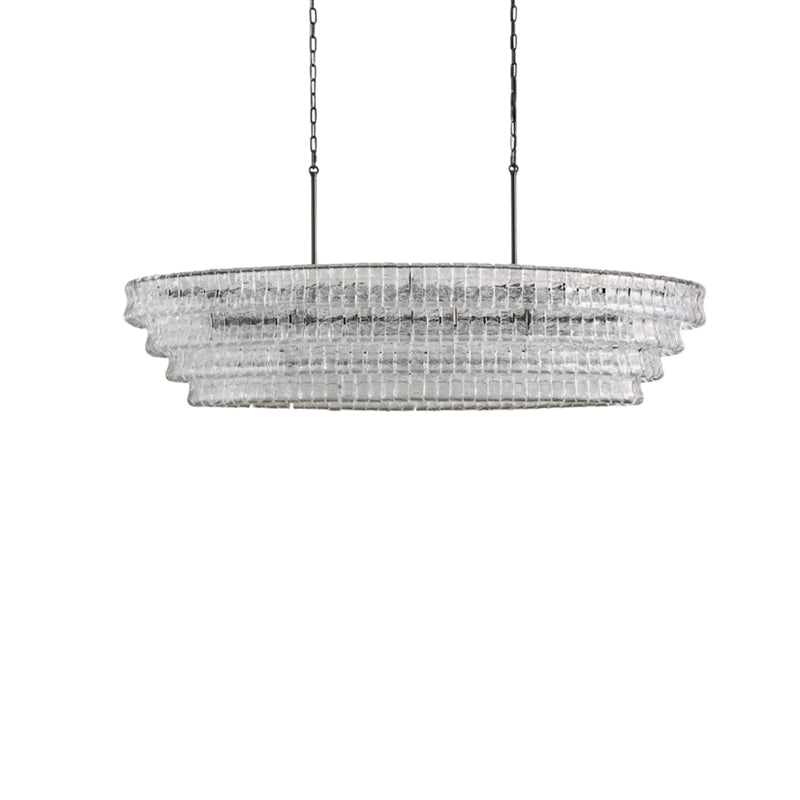 The green glass Albano Chandelier in a vibrant space.
