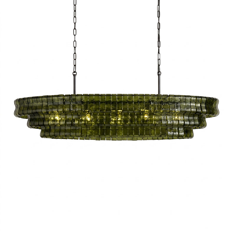 The gold finish Albano Chandelier over a wooden dining table.