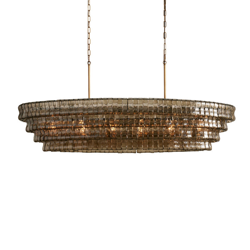 The green glass Albano Chandelier in a biophilic-designed room.