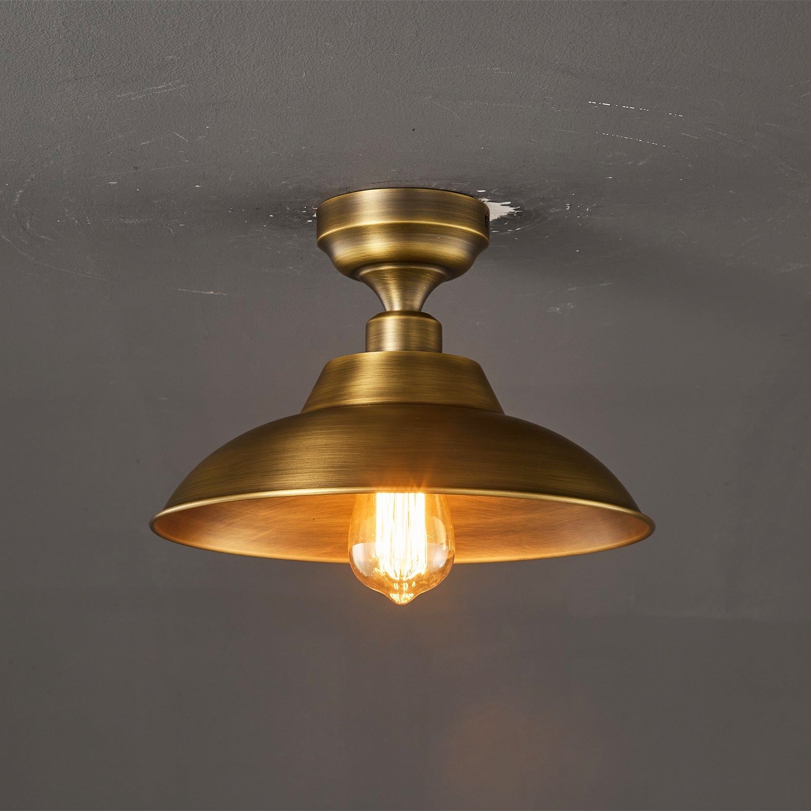 The lamp casting a warm, downward glow.