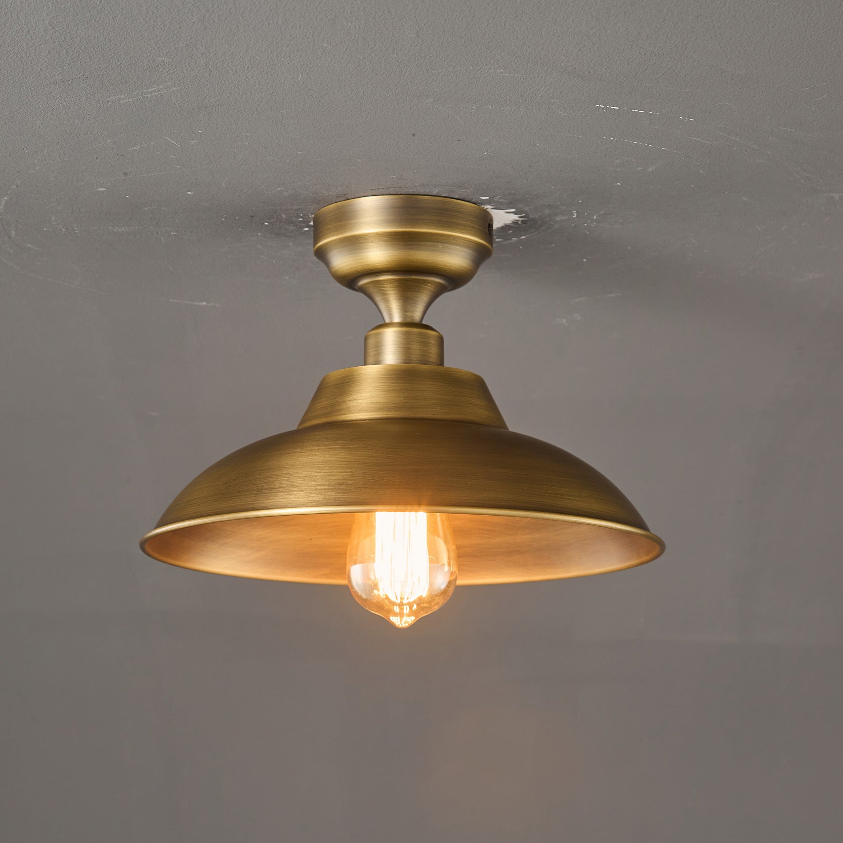 Top-down view of the antique brass shade.