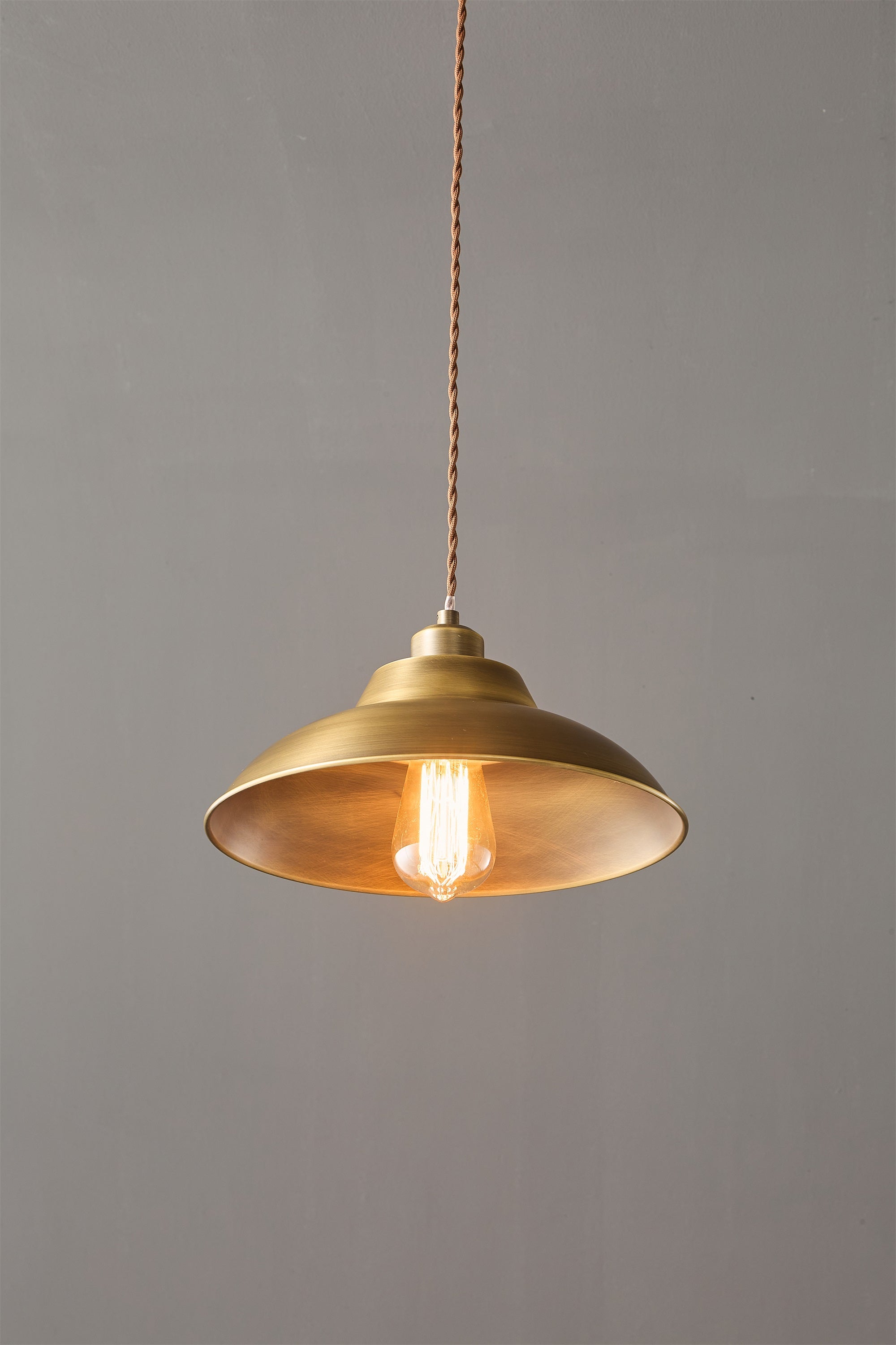 Lifestyle image showing the scale of the Aldorno lamp in a room.