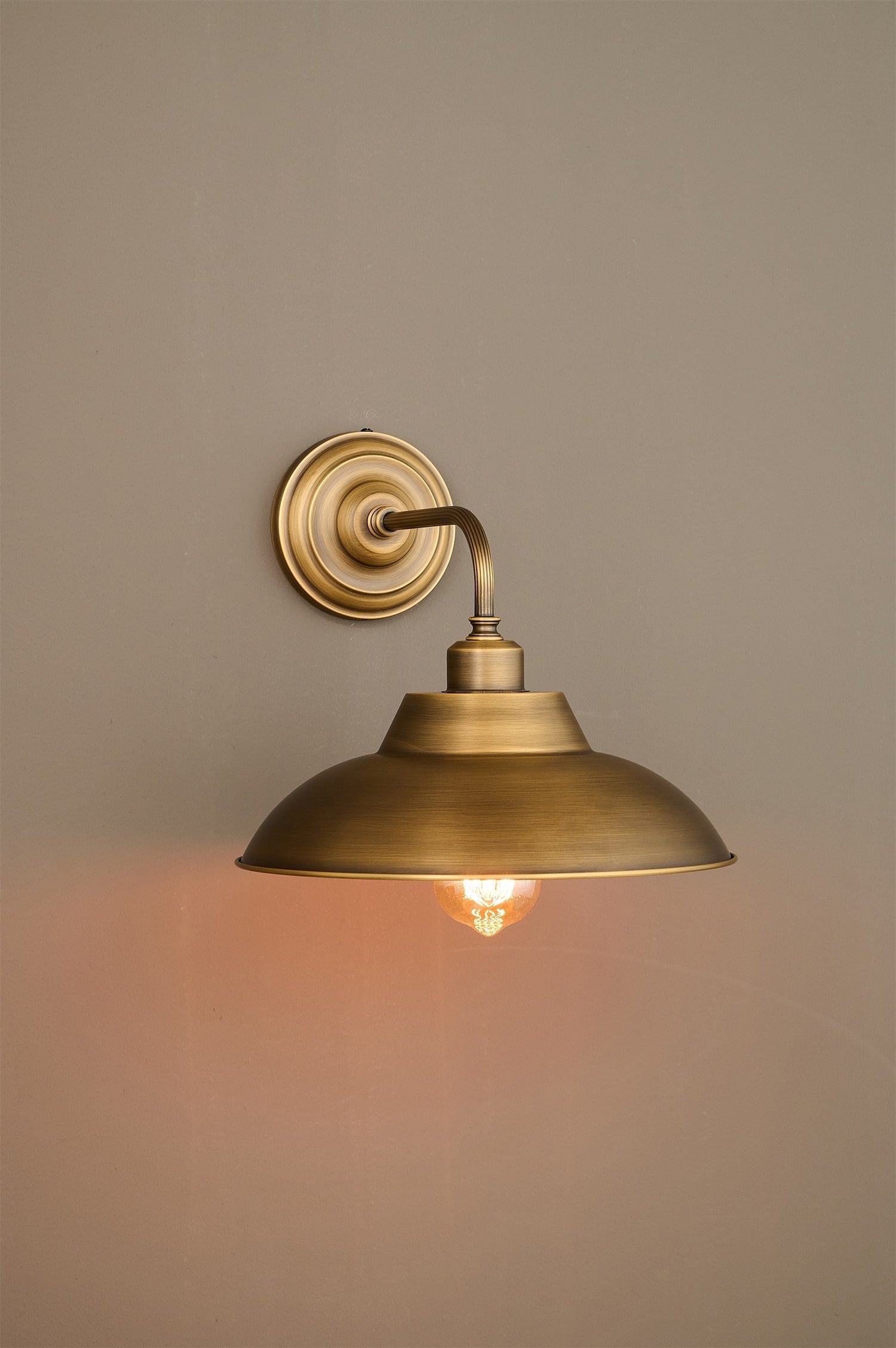 Bottom-up view showing the bulb placement in the Aldorno Sconce.