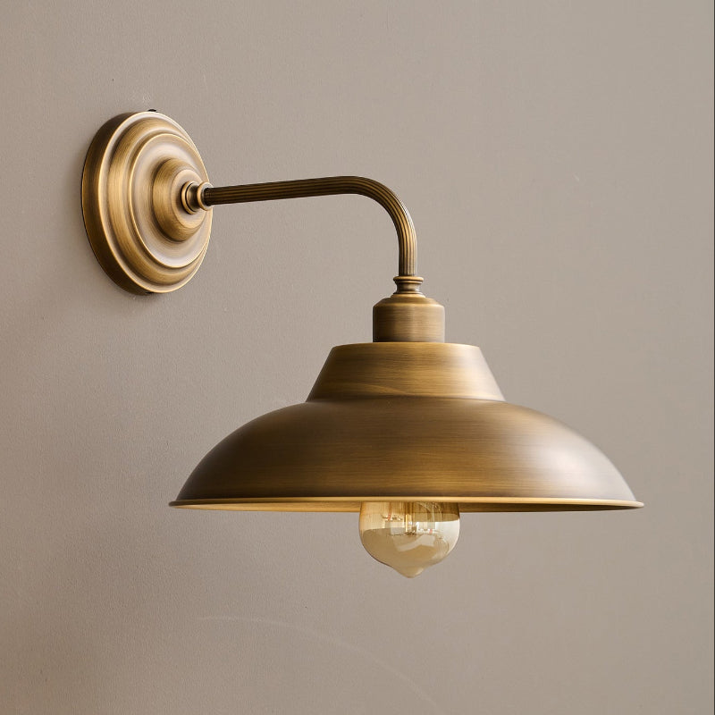 Pair of Aldorno Wall Sconces flanking a fireplace.