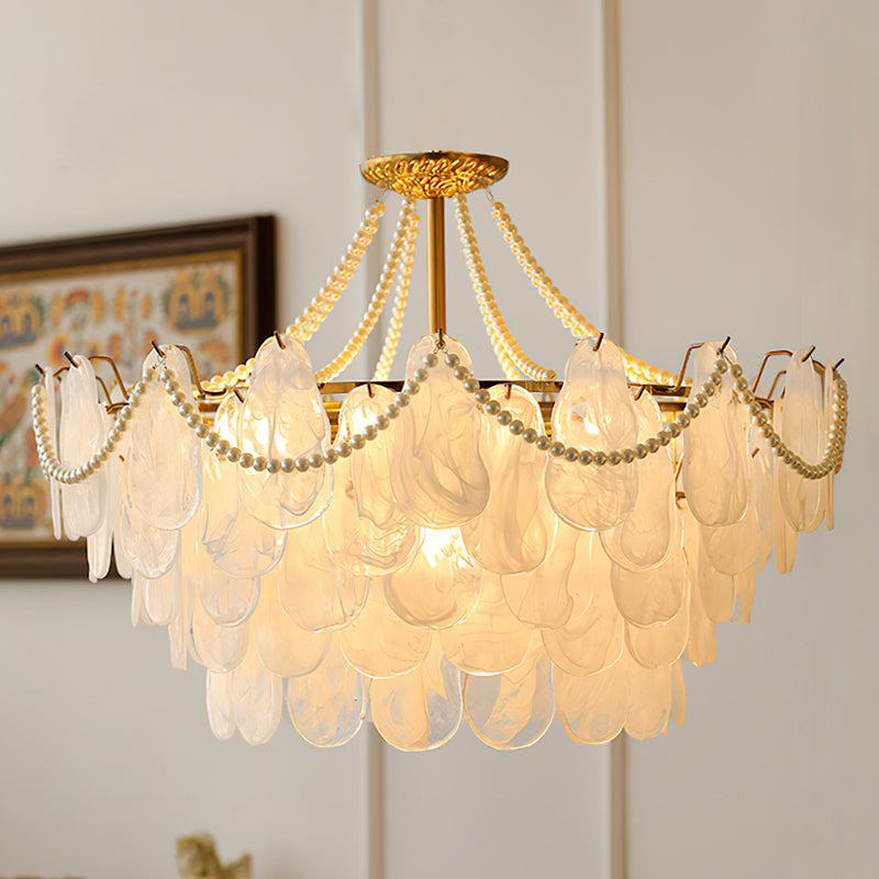 Alessia Chandelier Model A hanging in a modern living room.