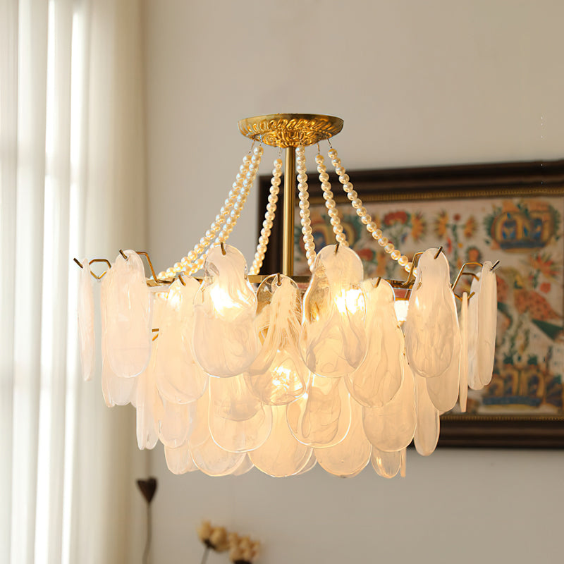 A large Alessia Chandelier in a high-ceiling entryway, making a grand statement.