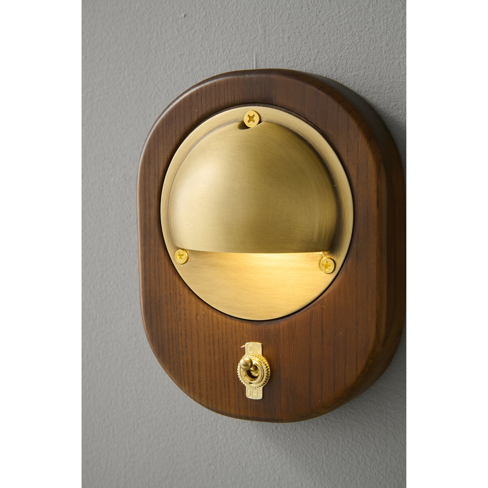 Alfi Wall Lamp, Walnut finish, in a rustic-modern interior.