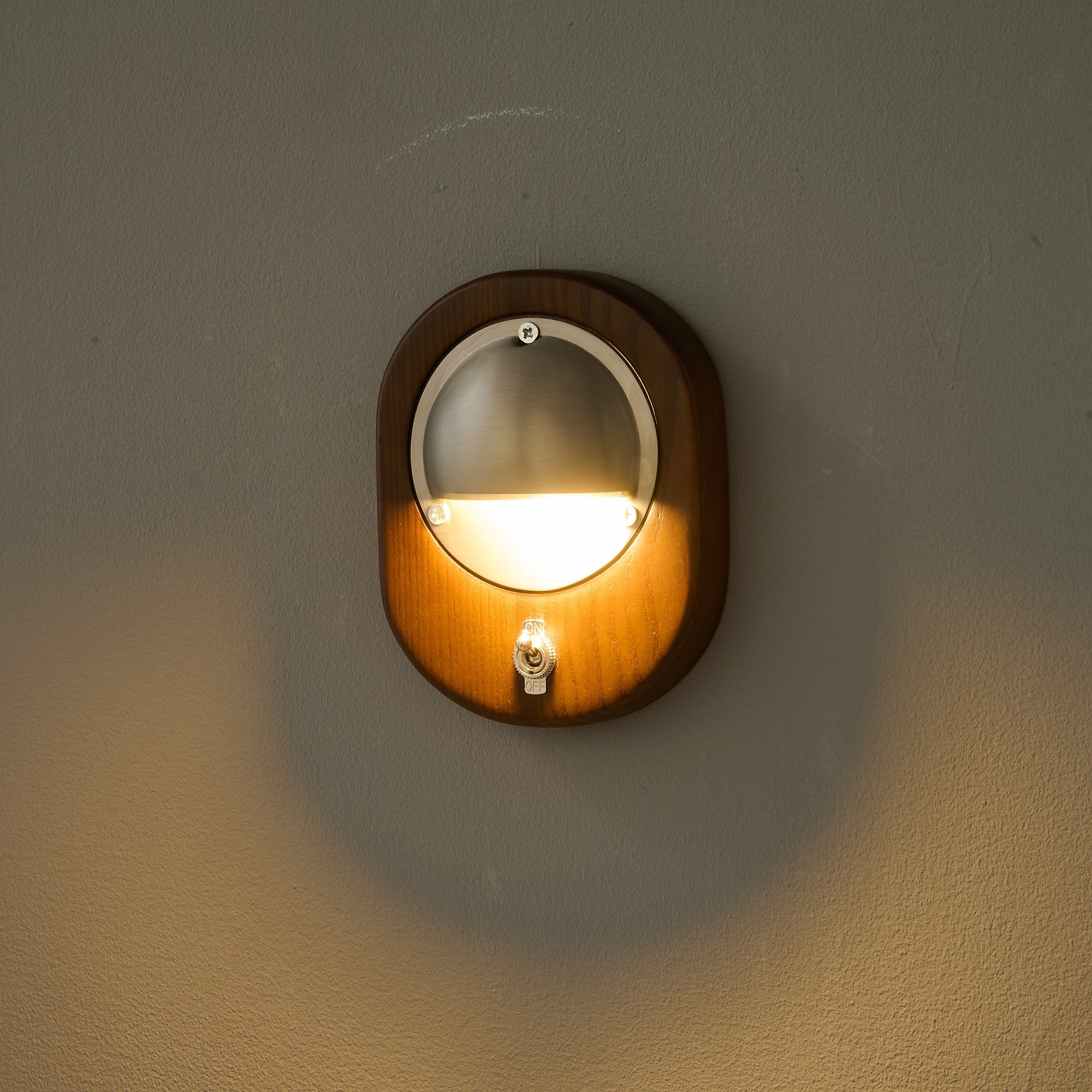 The Alfi Wall Lamp in a minimalist office space.