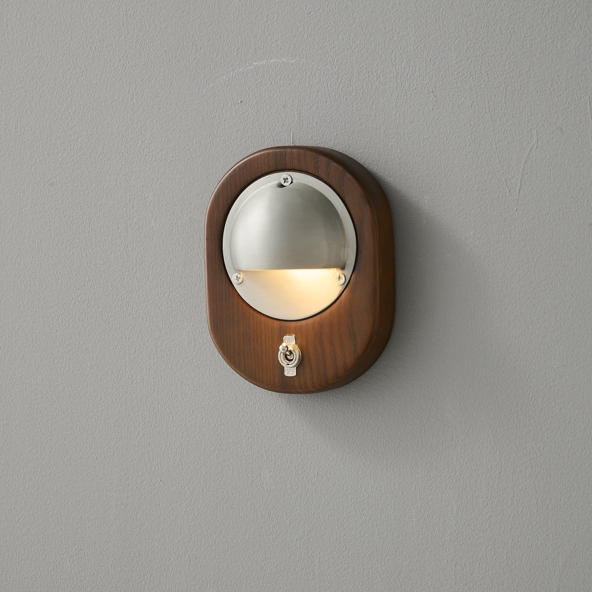 Another angle of the Alfi Wall Lamp's ash wood body.