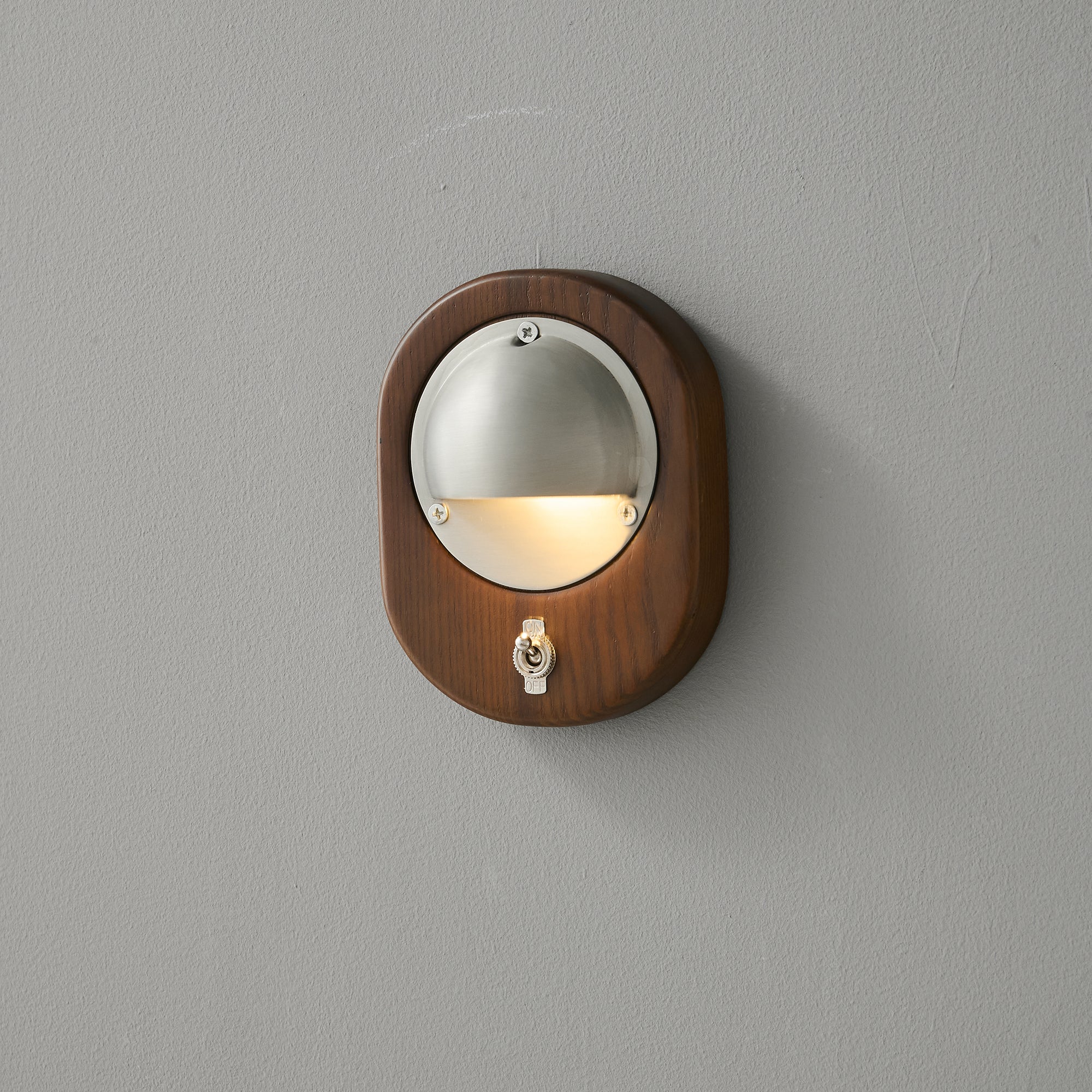 Another angle of the Alfi Wall Lamp's ash wood body.